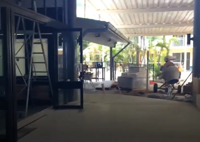 Bar and dining area coming together with a concrete mixer in view. Drinks will be getting mixed instead soon enough.